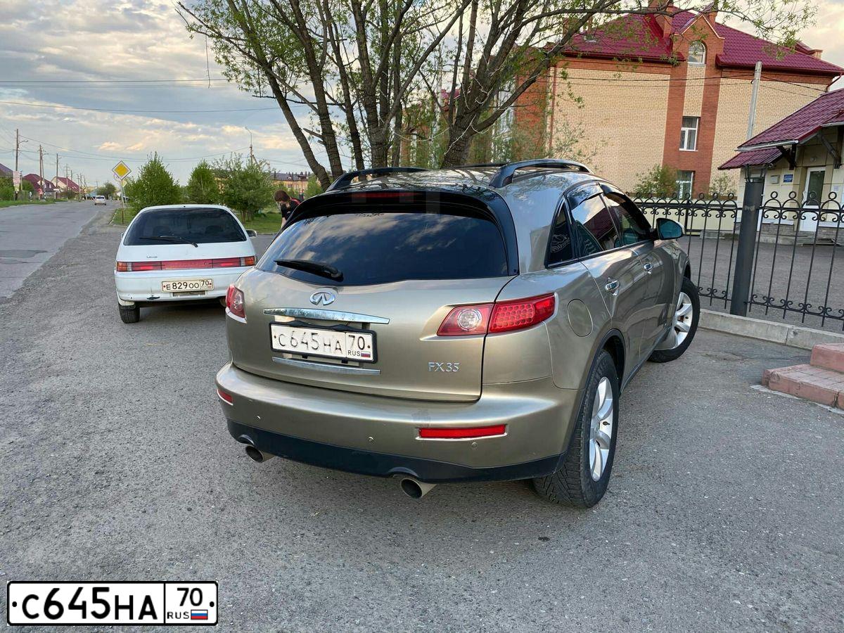 Фото автомобиля INFINITI QX70 /FX/, 2003 — госномер А502ЕА155. Цвет: ЗОЛОТИСТЫЙ