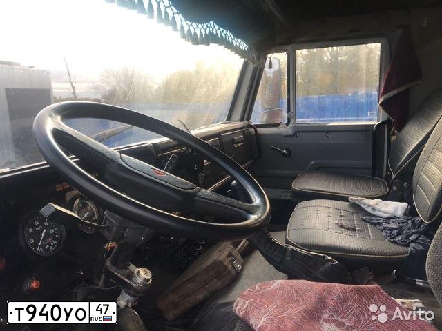 Фото автомобиля KAMAZ 55111 /6X4/, 2001 — госномер Т940УО47. Цвет: СВЕТЛО-ДЫМЧАТЫЙ