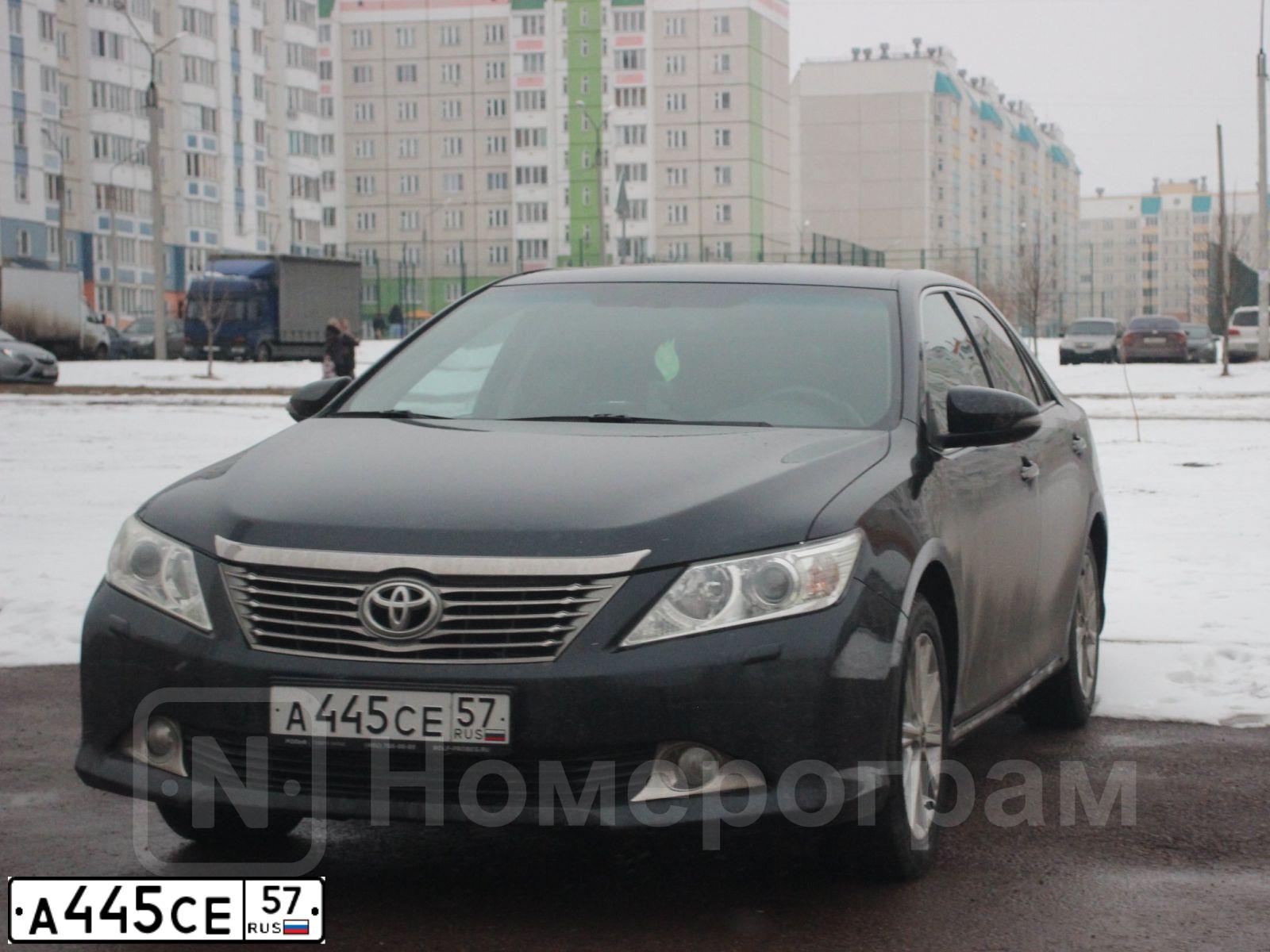 Фото автомобиля TOYOTA CAMRY, 2012 — госномер А445СЕ57. Цвет: СЕРЫЙ ТЕМНЫЙ