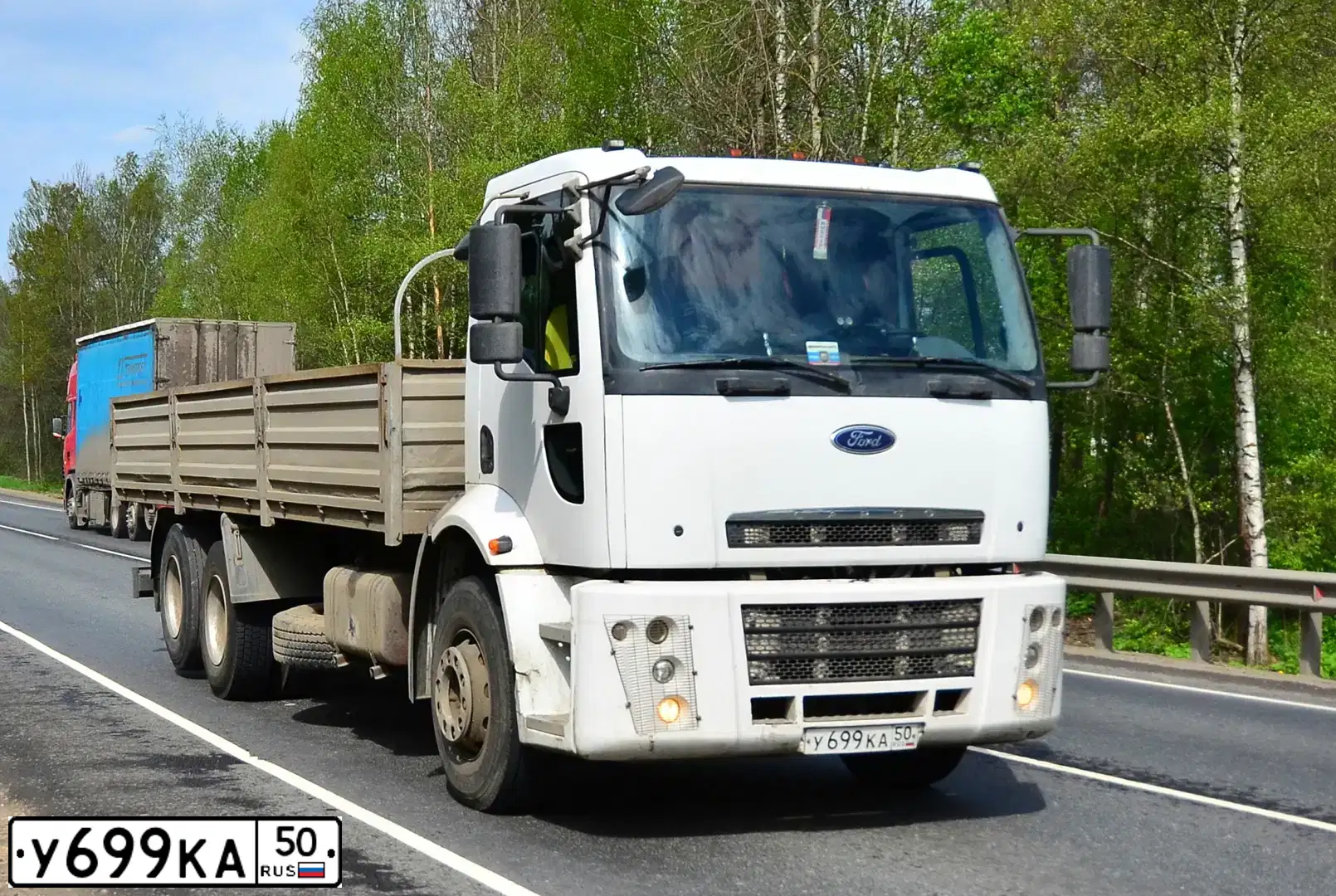 Фото автомобиля FORD CARGO, 2010 — госномер У699КА50. Цвет: БЕЛЫЙ