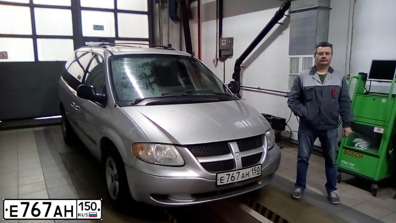 Фото автомобиля DODGE /GRAND/ CARAVAN, 2002 — госномер М233ХВ35. Цвет: Серый
