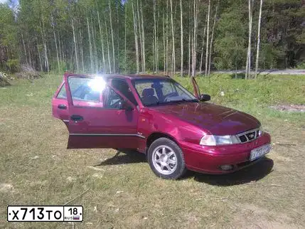 Фото автомобиля DAEWOO NEXIA, 2007 — госномер К510РВ82. Цвет: БОРДОВЫЙ