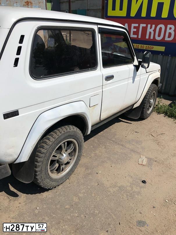 Фото автомобиля LADA 2121 NIVA, 1998 — госномер Н287ТУ57. Цвет: БЕЛО-ЖЕЛТЫЙ