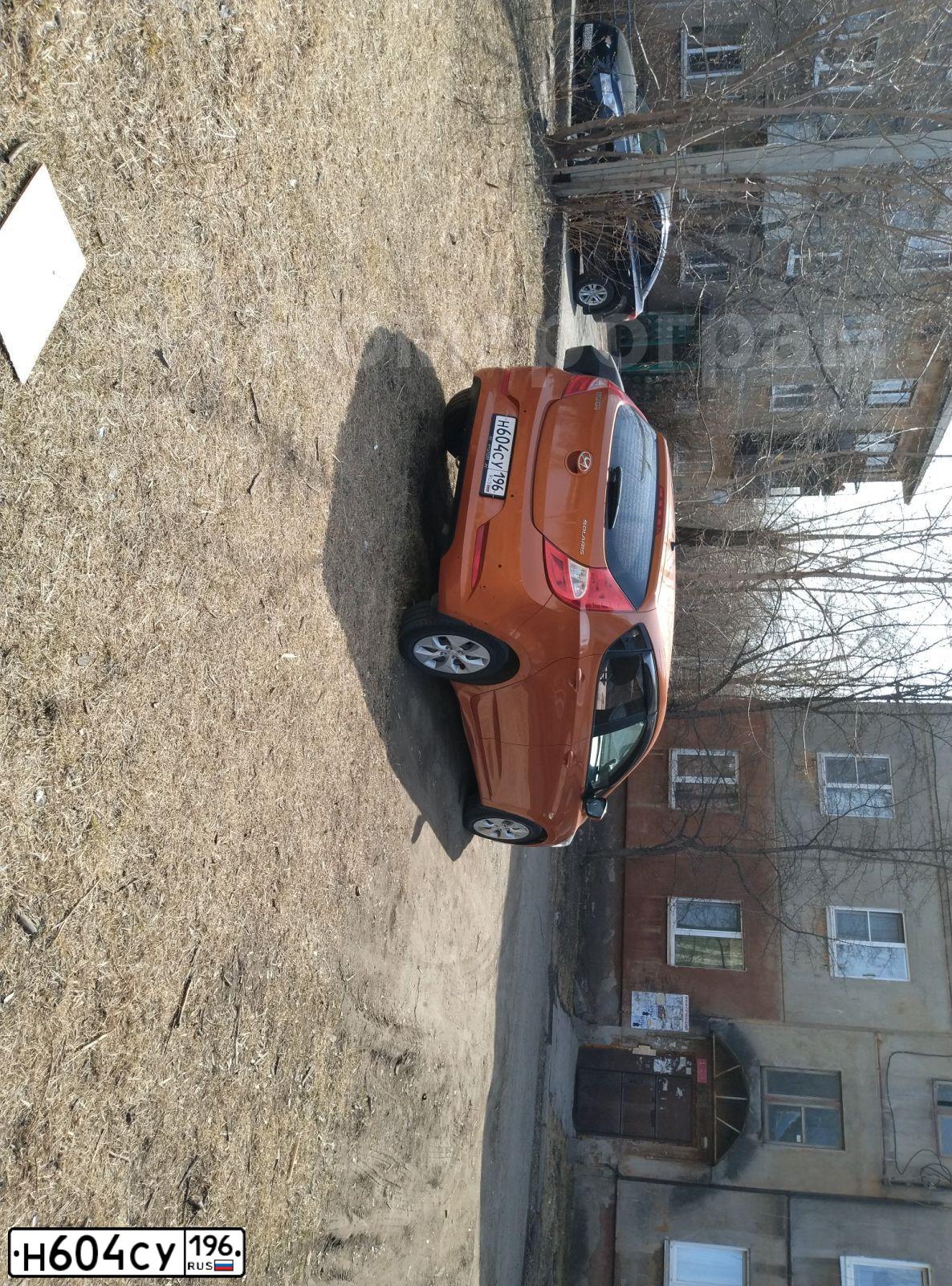 Фото автомобиля HYUNDAI SOLARIS, 2015 — госномер Н604СУ196. Цвет: Оранжевый