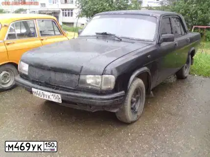 Фото автомобиля ГАЗ 310290, 1995 — госномер К111ВО50. Цвет: ЧЕРНЫЙ