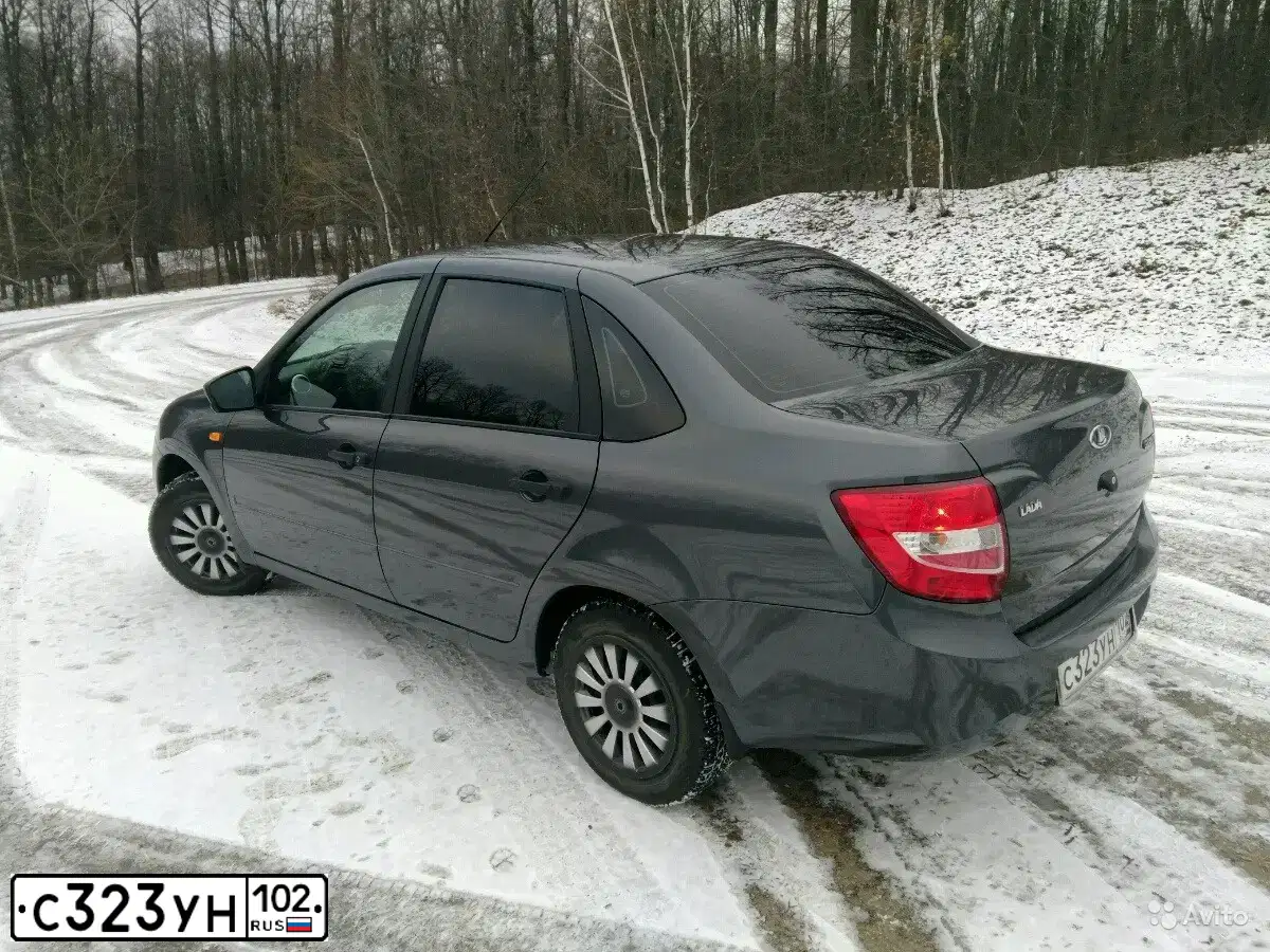 Фото автомобиля LADA 2190 GRANTA, 2016 — госномер Х115ОР56. Цвет: СЕРЕБРИСТО-ТЕМНО-СЕРЫЙ