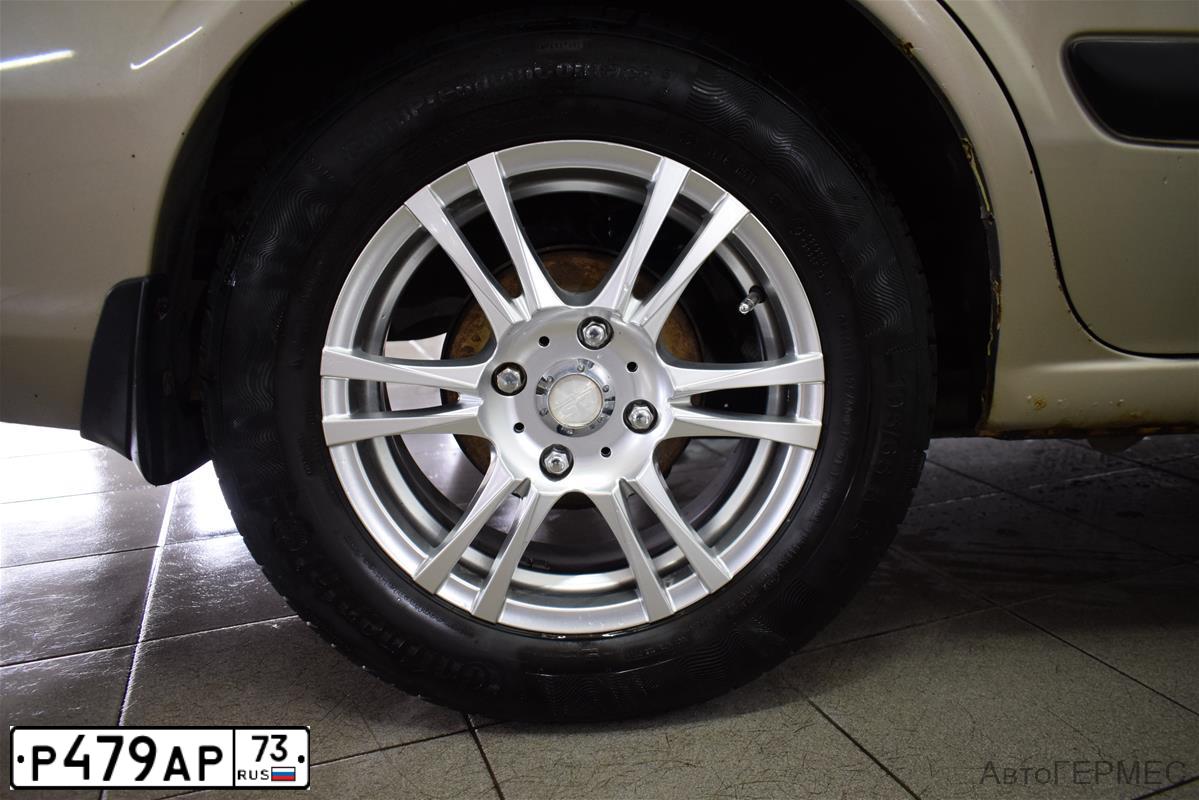 Фото автомобиля NISSAN ALMERA, 2003 — госномер Е409ТР69. Цвет: ЗОЛОТИСТЫЙ