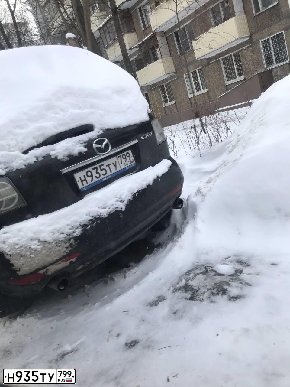 Фото автомобиля MAZDA CX-7, 2010 — госномер К128ТО147. Цвет: ЧЕРНЫЙ