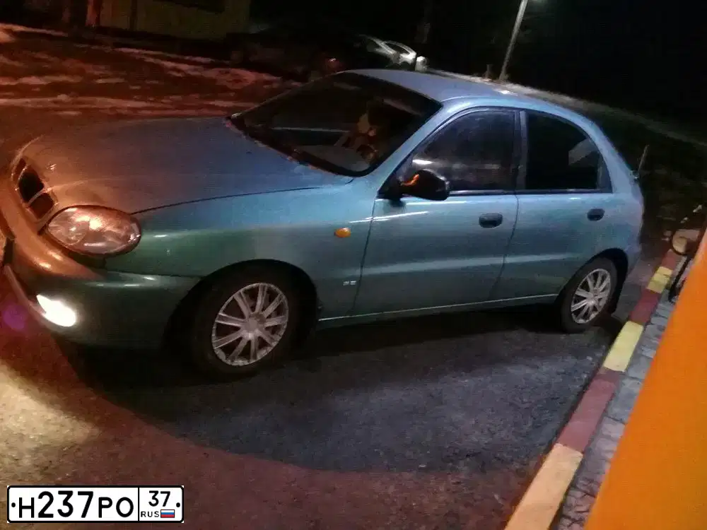 Фото автомобиля DAEWOO LANOS, 2000 — госномер С135АЕ180. Цвет: ЗЕЛЕНЫЙ