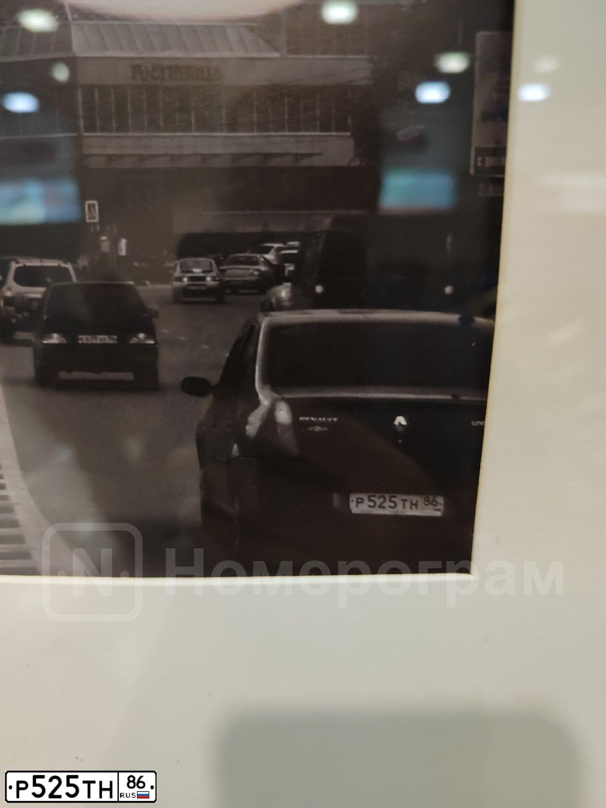 Фото автомобиля RENAULT LOGAN, 2009 — госномер Р525ТН86. Цвет: СИНИЙ МЕТАЛЛИК