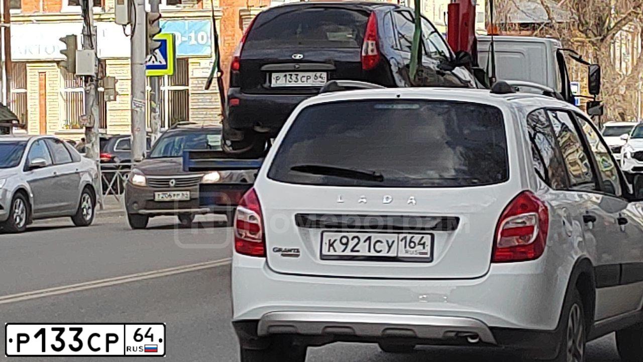Фото автомобиля LADA 1119 KALINA, 2007 — госномер Р133СР64. Цвет: Темный Сине-Фиолетовый