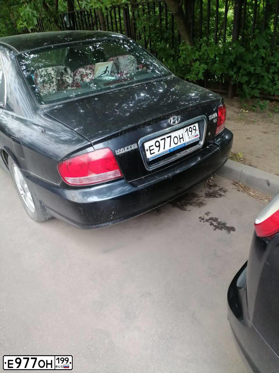Фото автомобиля TAGAZ SONATA, 2008 — госномер Е977ОН199. Цвет: ЧЕРНЫЙ