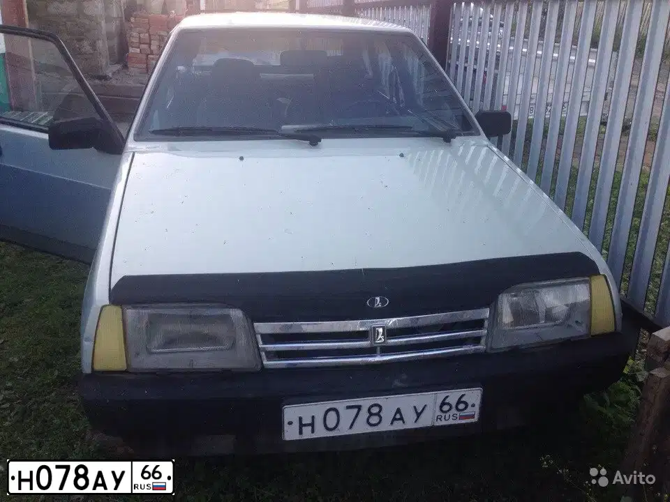 Фото автомобиля LADA 2109 SAMARA, 1988 — госномер Р118ТР77. Цвет: Серо-желто-зеленый