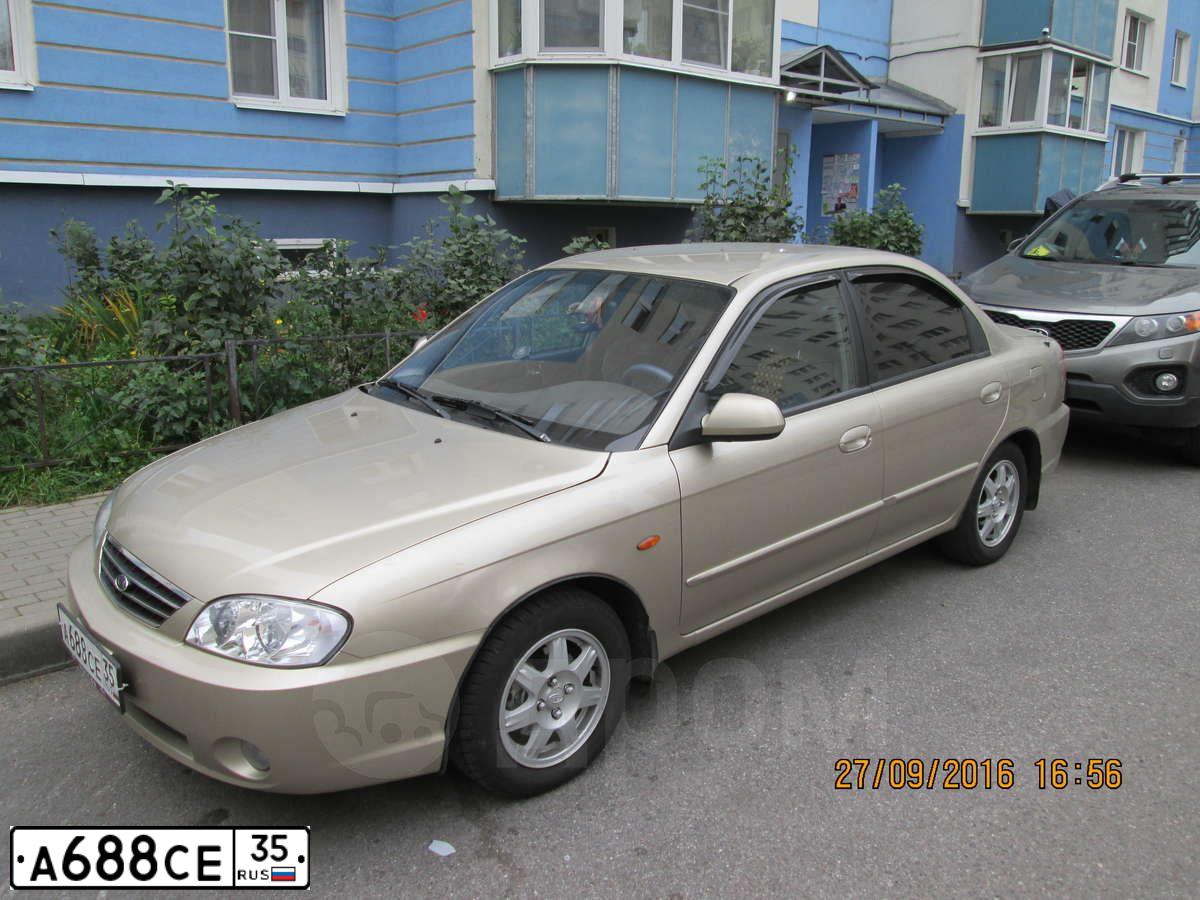 Фото автомобиля KIA SPECTRA, 2009 — госномер А688СЕ35. Цвет: Золотисто-бежевый