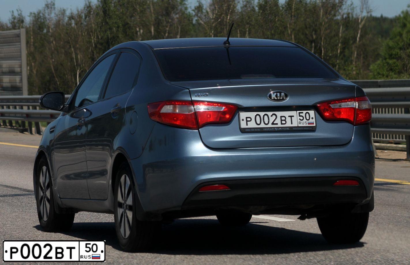 Фото автомобиля LADA 2105, 1995 — госномер Р002ВТ50. Цвет: Белый