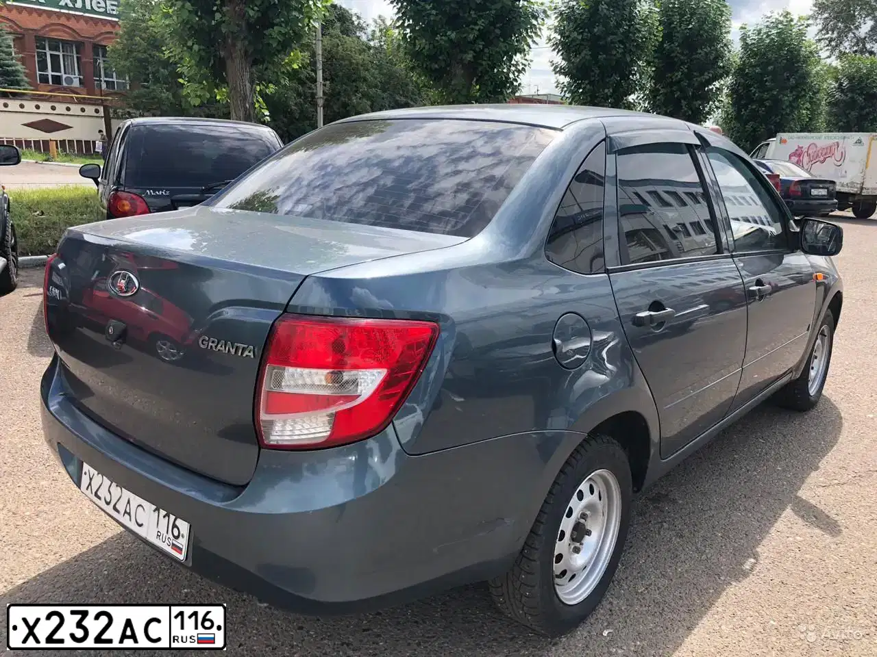 Фото автомобиля LADA 2190 GRANTA, 2015 — госномер Х232АС116. Цвет: Серо-Синий