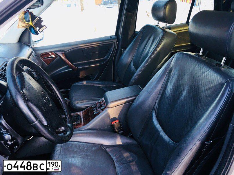 Фото автомобиля NISSAN PRIMERA, 2004 — госномер М012РВ69. Цвет: ЧЕРНЫЙ