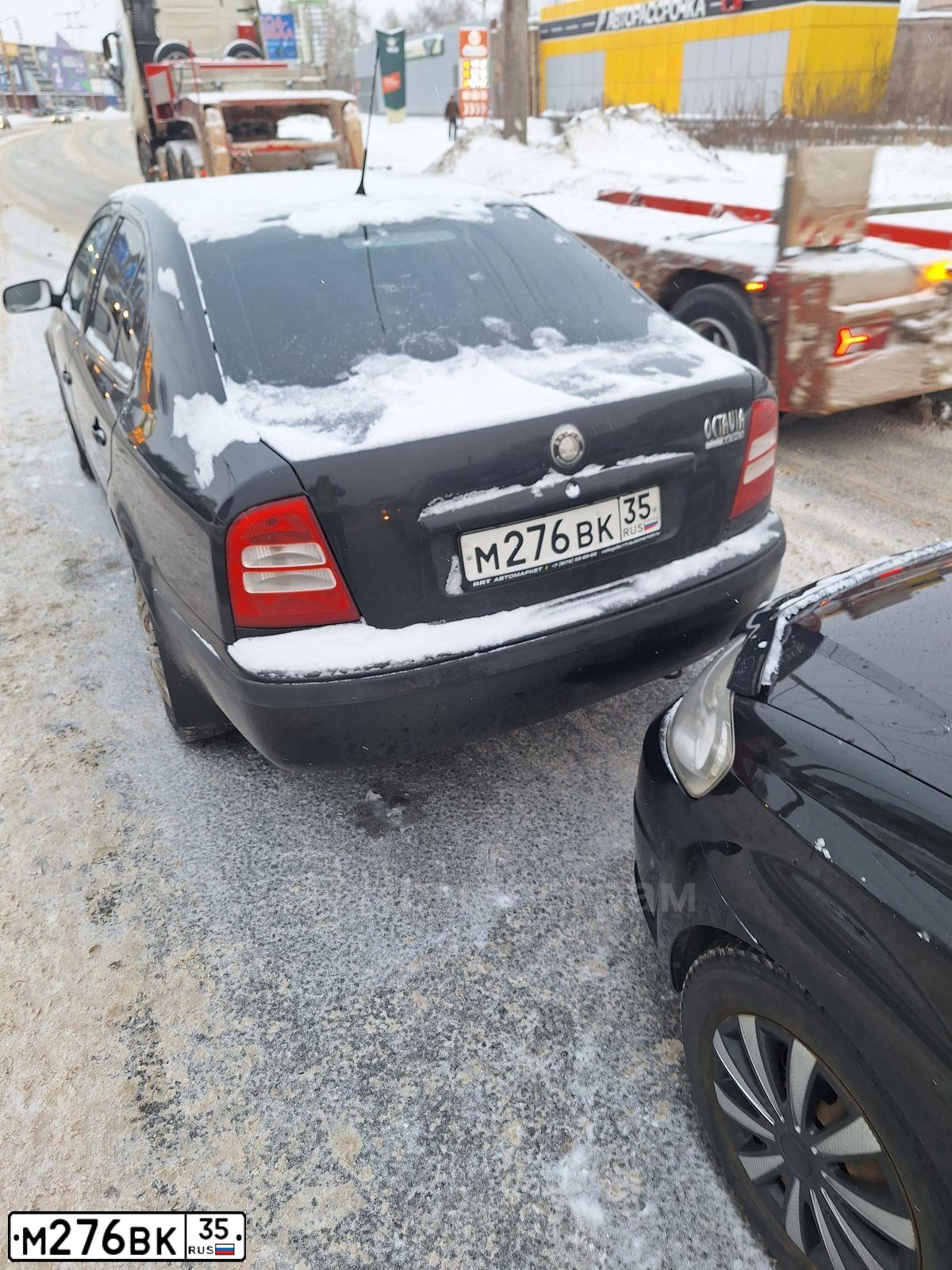 Фото автомобиля SKODA OCTAVIA, 2008 — госномер А556ОН35. Цвет: ЧЕРНЫЙ
