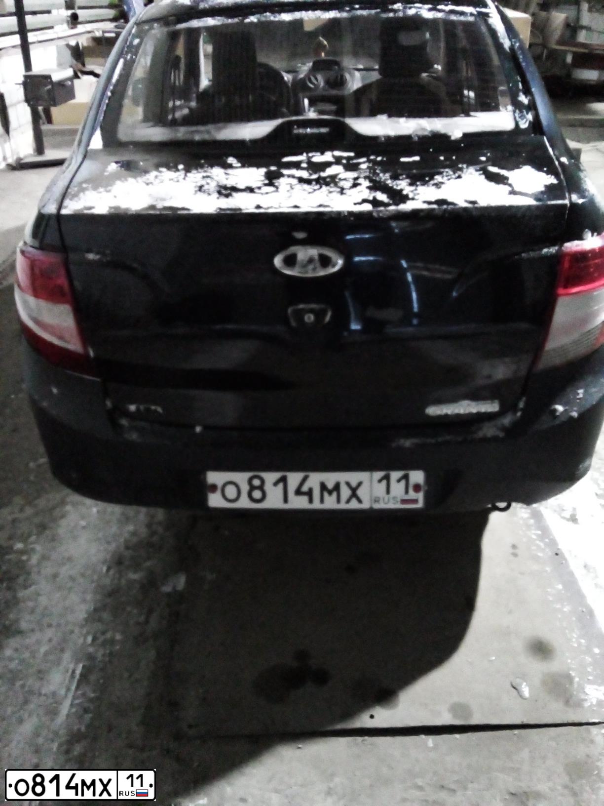 Фото автомобиля LADA 2190 GRANTA, 2012 — госномер О814МХ11. Цвет: СИНЕ-ЧЕРНЫЙ