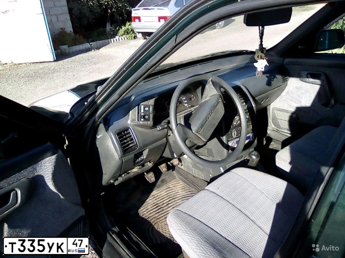 Фото автомобиля LADA 2110, 2003 — госномер Е140КХ761. Цвет: ТЕМНО ЗЕЛЕНЫЙ