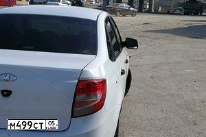 Фото автомобиля LADA 2190 GRANTA, 2012 — госномер М499СТ05. Цвет: Белый