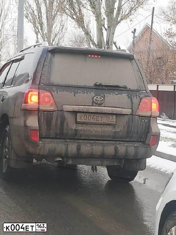 Фото автомобиля KIA SORENTO, 2005 — госномер К004ЕТ163. Цвет: ЧЕРНЫЙ СЕРЫЙ