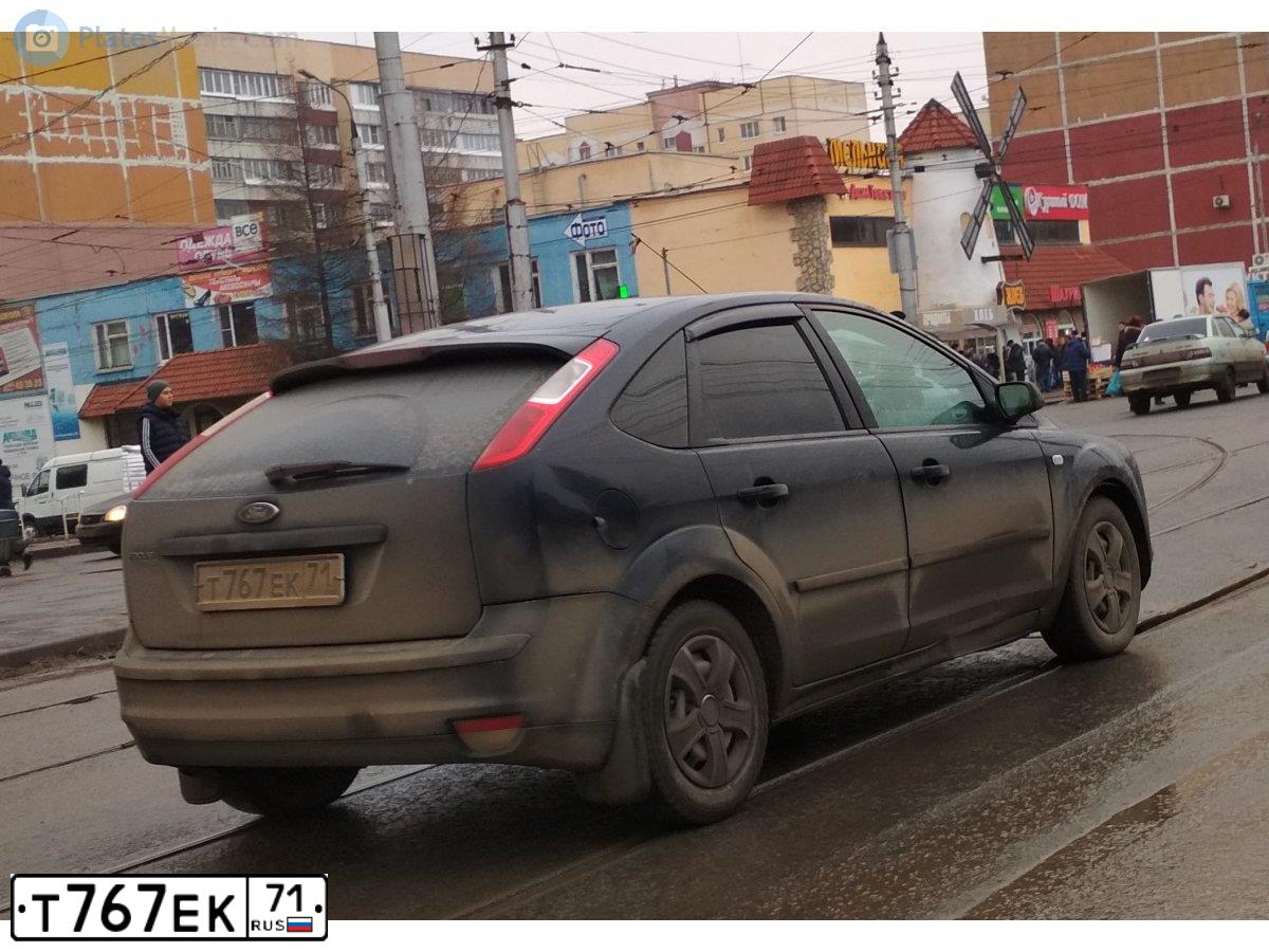 Фото автомобиля FORD FOCUS, 2005 — госномер Т767ЕК71. Цвет: ТЕМНО-СИНИЙ