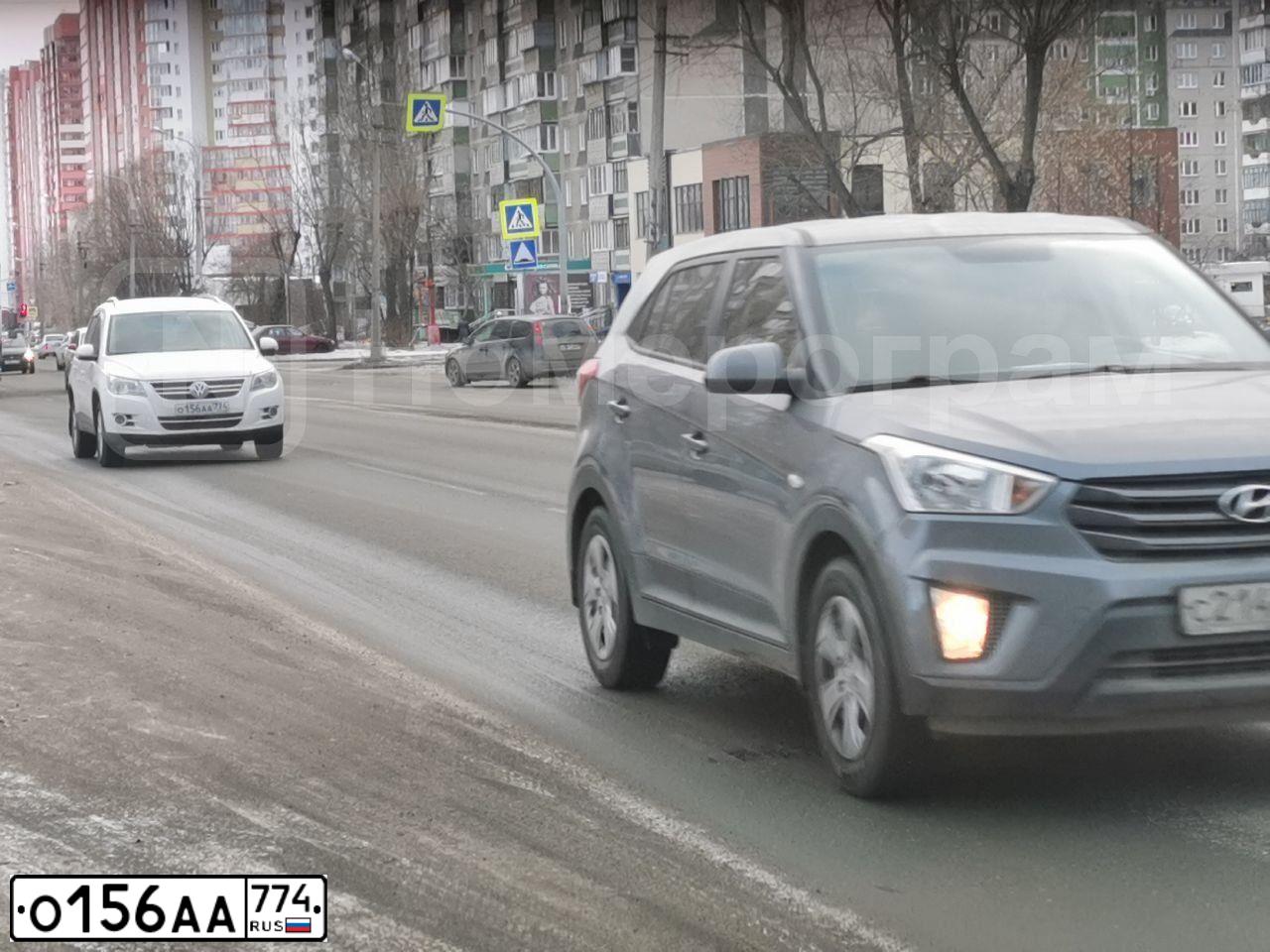 Фото автомобиля VOLKSWAGEN TIGUAN, 2011 — госномер А788СО174. Цвет: Белый