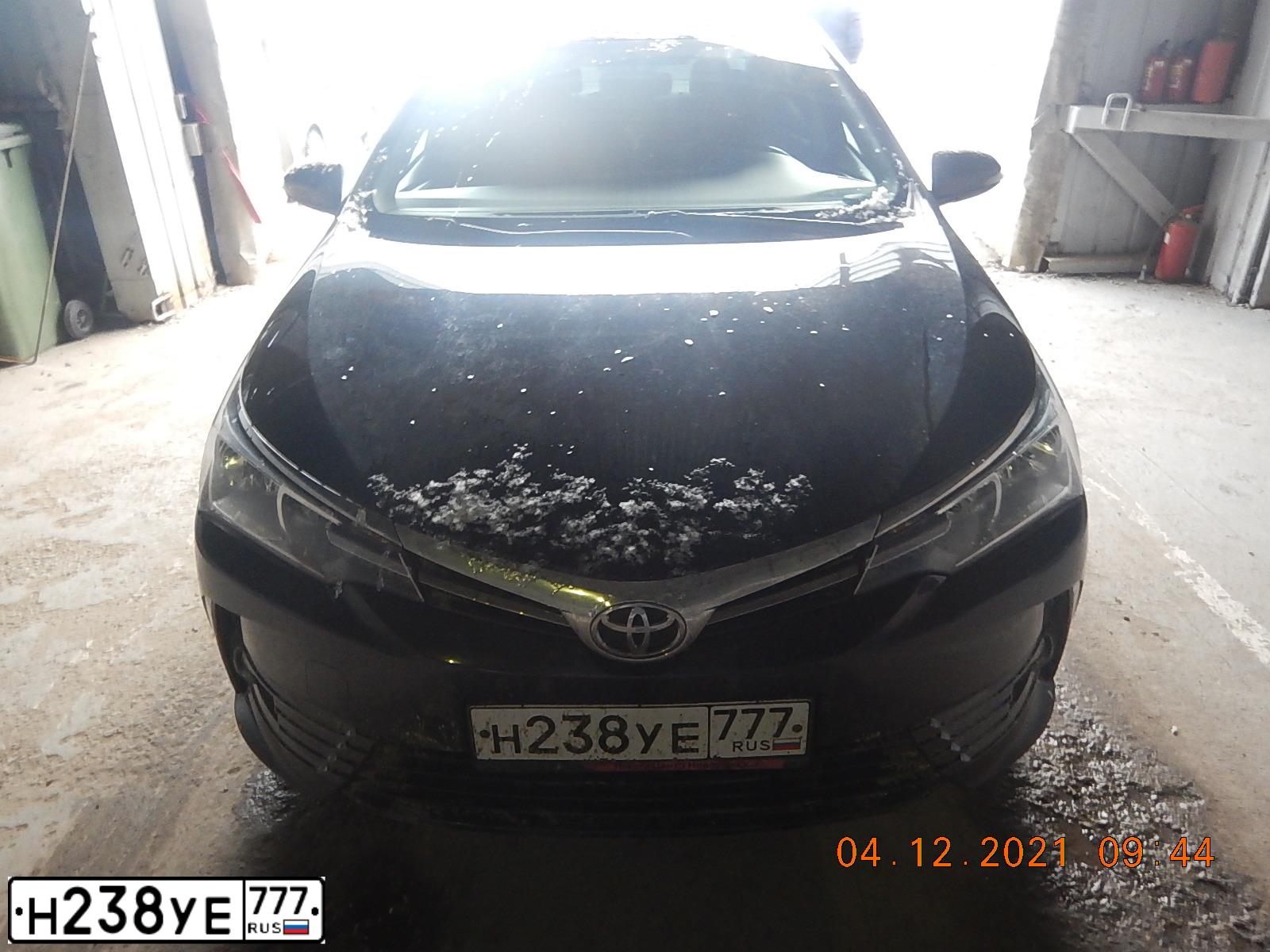 Фото автомобиля TOYOTA COROLLA, 2016 — госномер Н238УЕ777. Цвет: ЧЕРНЫЙ