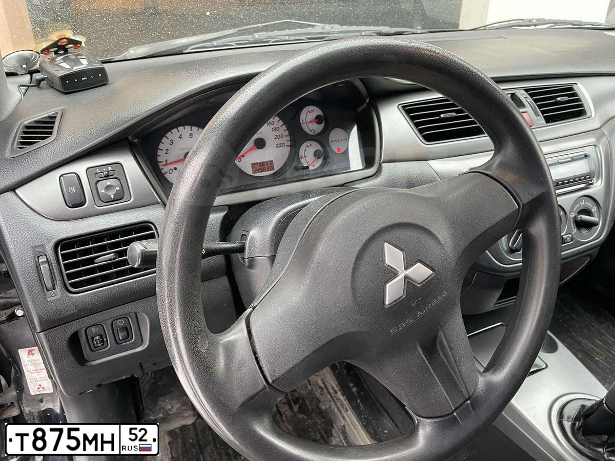 Фото автомобиля MITSUBISHI LANCER, 2007 — госномер Т875МН52. Цвет: ЧЕРНЫЙ