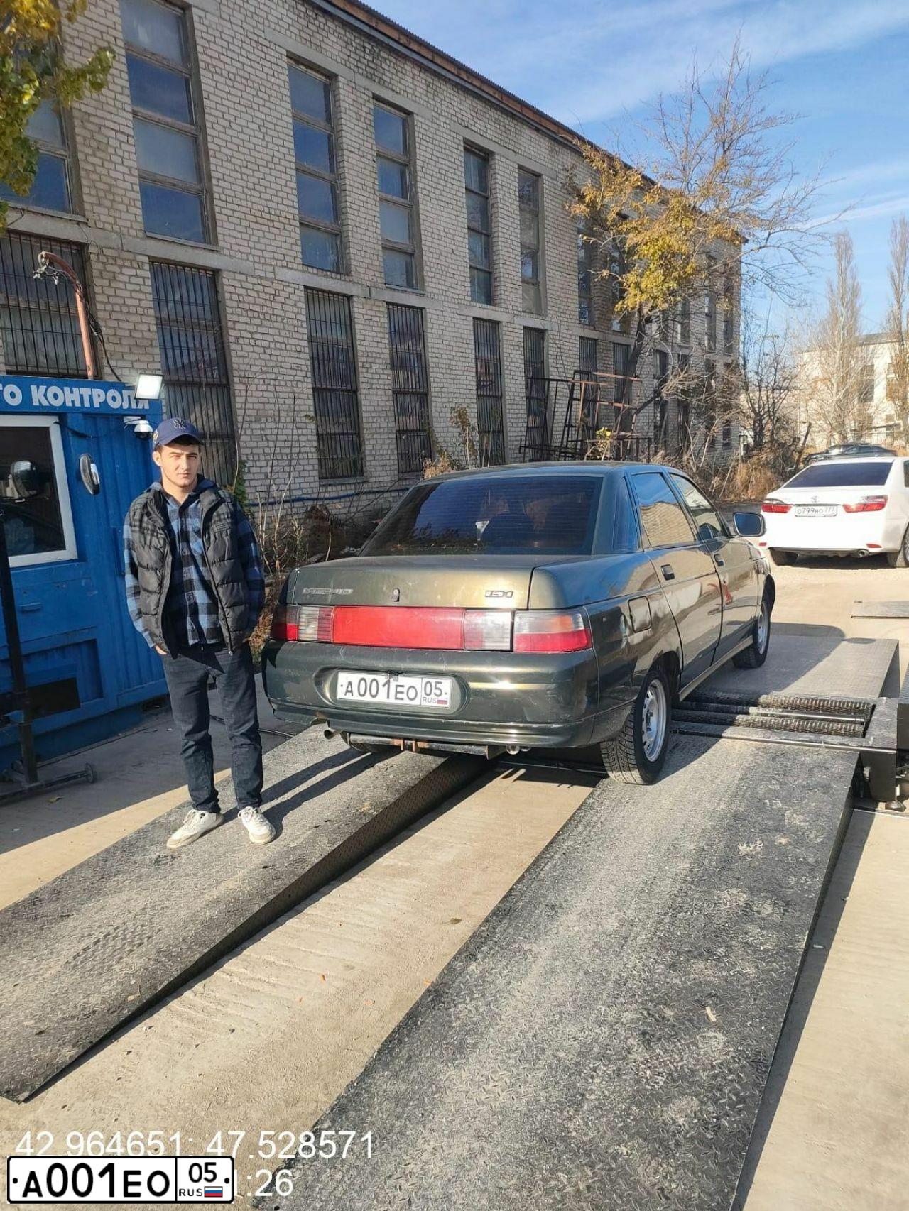 Фото автомобиля LADA 2110, 2006 — госномер А001ЕО05. Цвет: ЗОЛОТИСТЫЙ ТЕМНО-ЗЕЛЕНЫЙ
