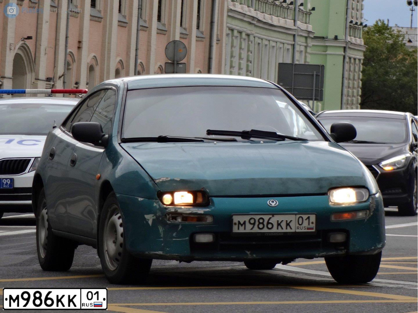 Фото автомобиля МАЗДА 323, 1995 — госномер А876МК761. Цвет: ЗЕЛЕНЫЙ