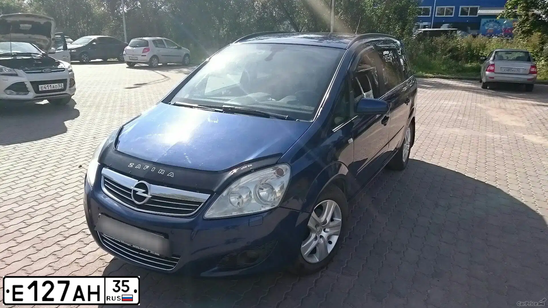 Фото автомобиля OPEL ZAFIRA, 2008 — госномер Е243КО53. Цвет: СИНИЙ
