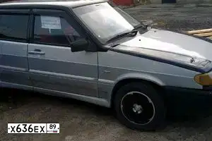 Фото автомобиля LADA 2115 SAMARA, 2005 — госномер Х636ЕХ89. Цвет: СЕРЕБРИСТО-ЖЕЛТО-ГОЛУБОЙ
