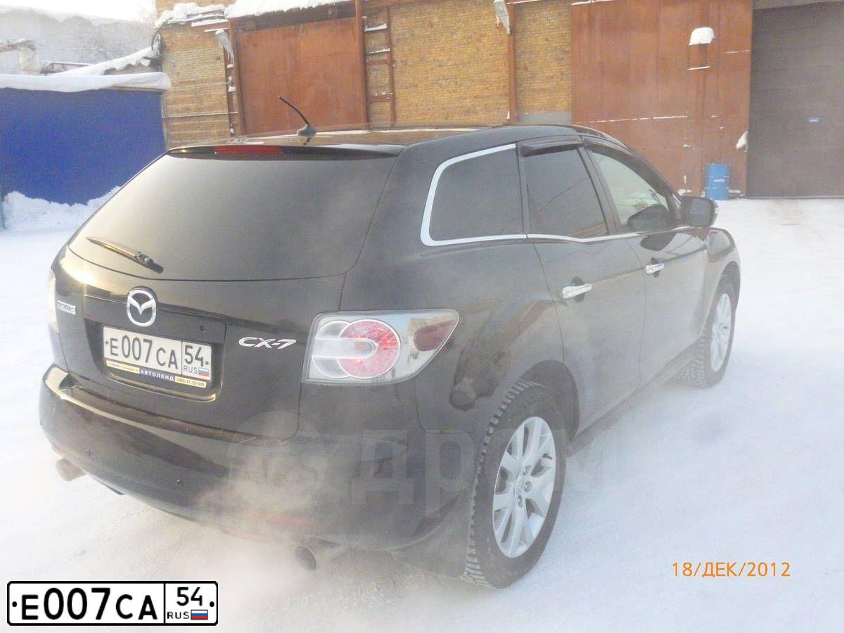 Фото автомобиля SUBARU FORESTER, 2012 — госномер Е007СА54. Цвет: ТЕМНО-СЕРЫЙ