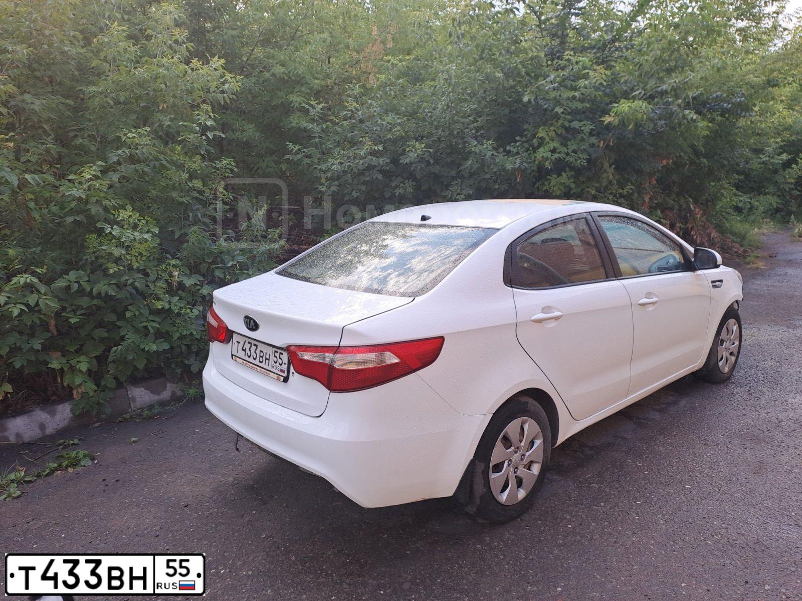 Фото автомобиля KIA RIO, 2014 — госномер Т433ВН55. Цвет: Белый