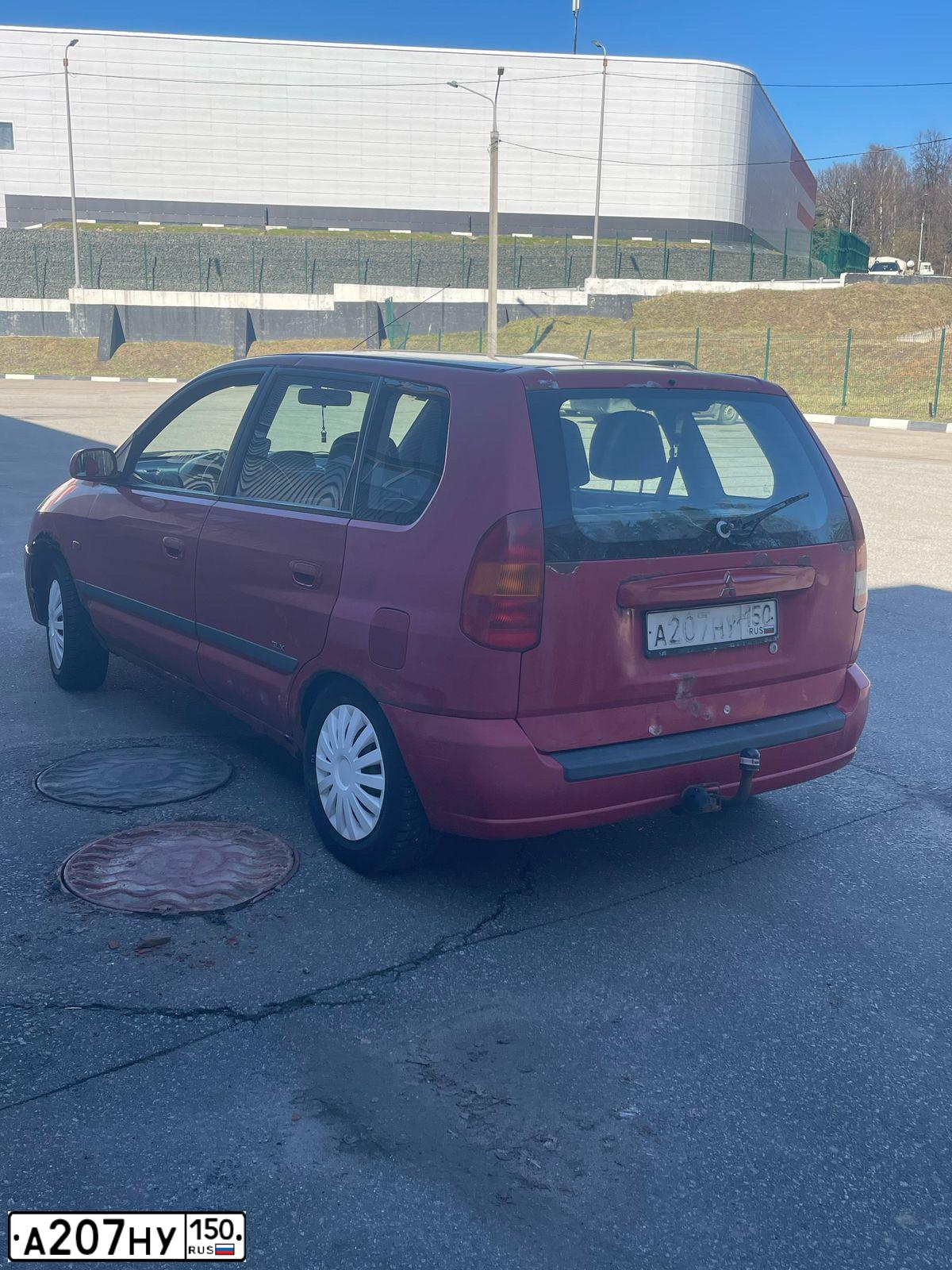 Фото автомобиля MITSUBISHI SPACE STAR, 1999 — госномер А207НУ150. Цвет: КРАСНЫЙ