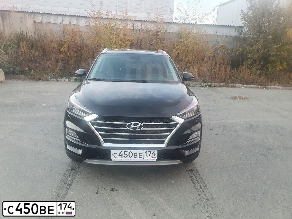 Фото автомобиля HYUNDAI TUCSON, 2019 — госномер Е077АМ977. Цвет: ЧЕРНЫЙ