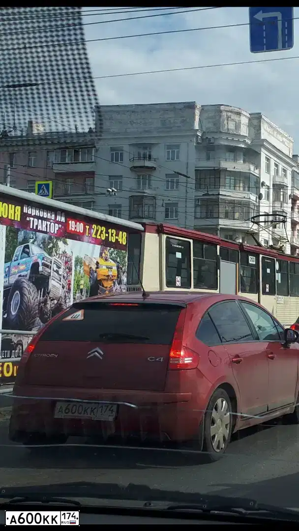 Фото автомобиля CITROEN C4, 2009 — госномер А600КК174. Цвет: Красный