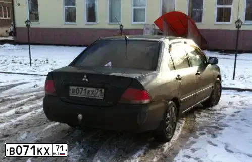 Фото автомобиля MITSUBISHI LANCER, 2006 — госномер В071КХ71. Цвет: ЧЕРНЫЙ