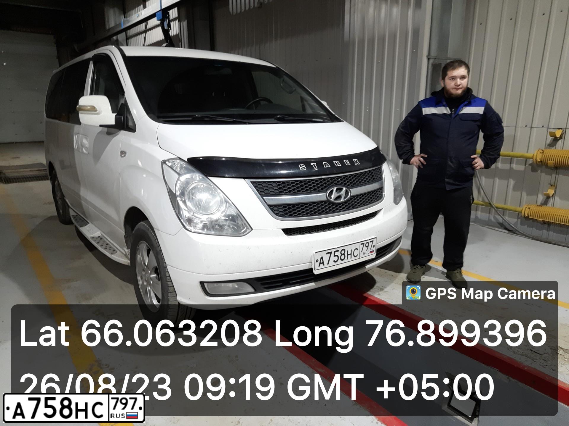 Фото автомобиля HYUNDAI GRAND STAREX, 2014 — госномер Н499МХ750. Цвет: БЕЛЫЙ