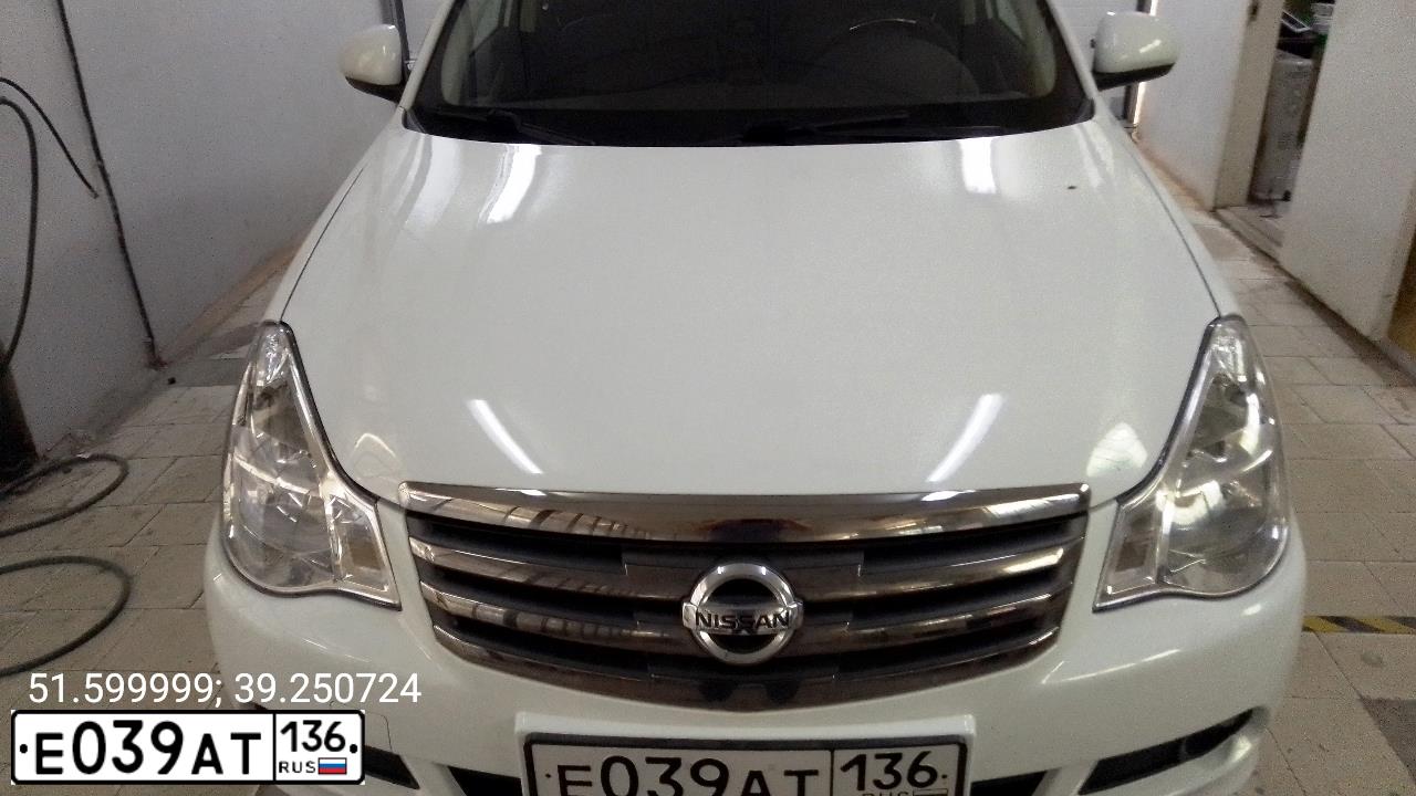 Фото автомобиля NISSAN ALMERA /AVTOVAZ/, 2017 — госномер Е039АТ136. Цвет: Белый