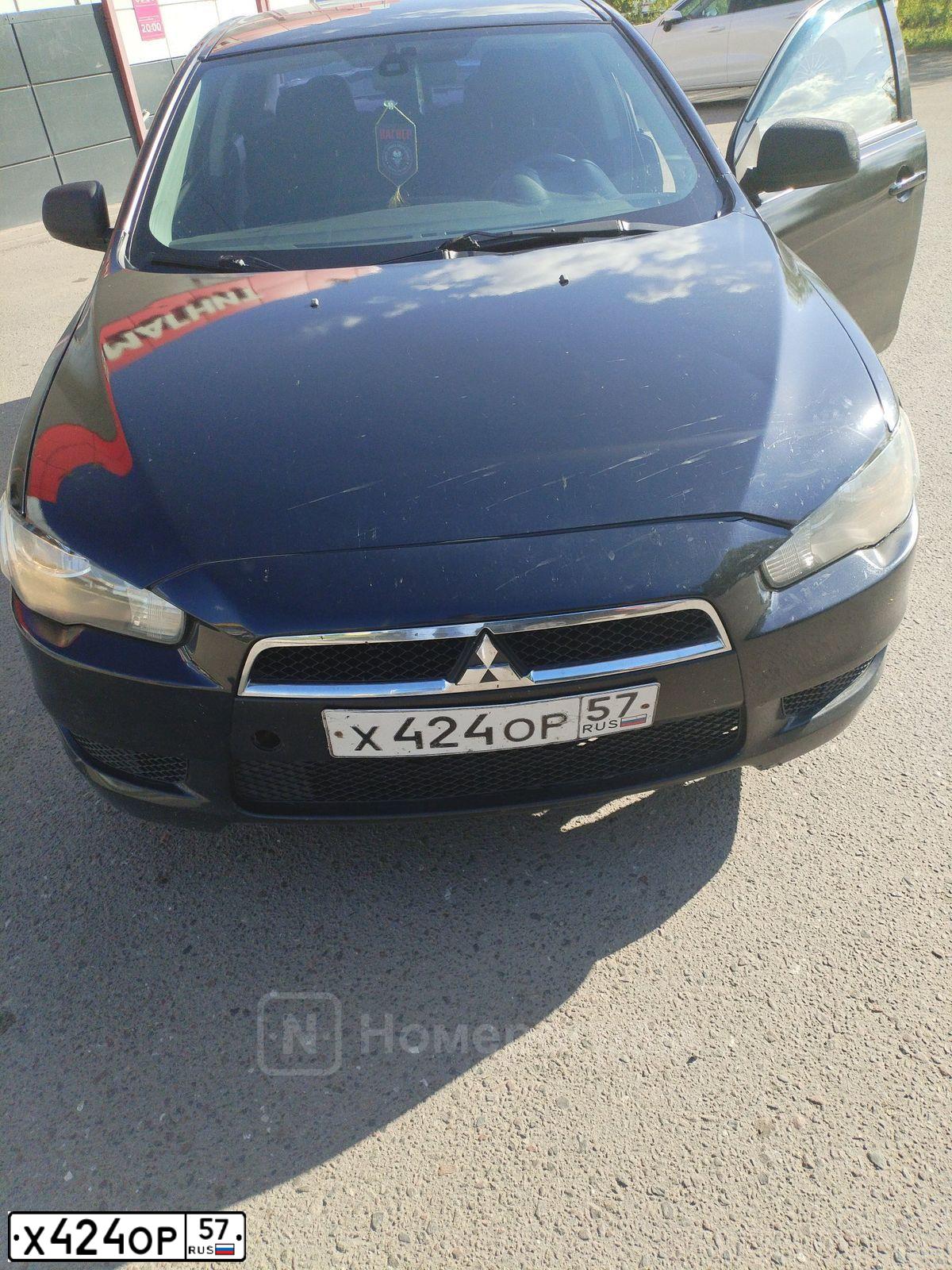 Фото автомобиля MITSUBISHI LANCER, 2007 — госномер Х424ОР57. Цвет: ЧЕРНЫЙ