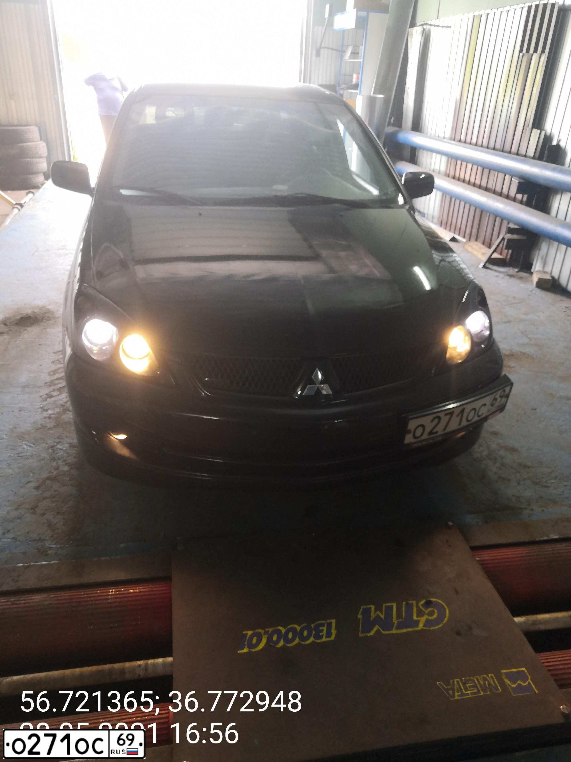 Фото автомобиля MITSUBISHI LANCER, 2006 — госномер О271ОС69. Цвет: ЧЕРНЫЙ