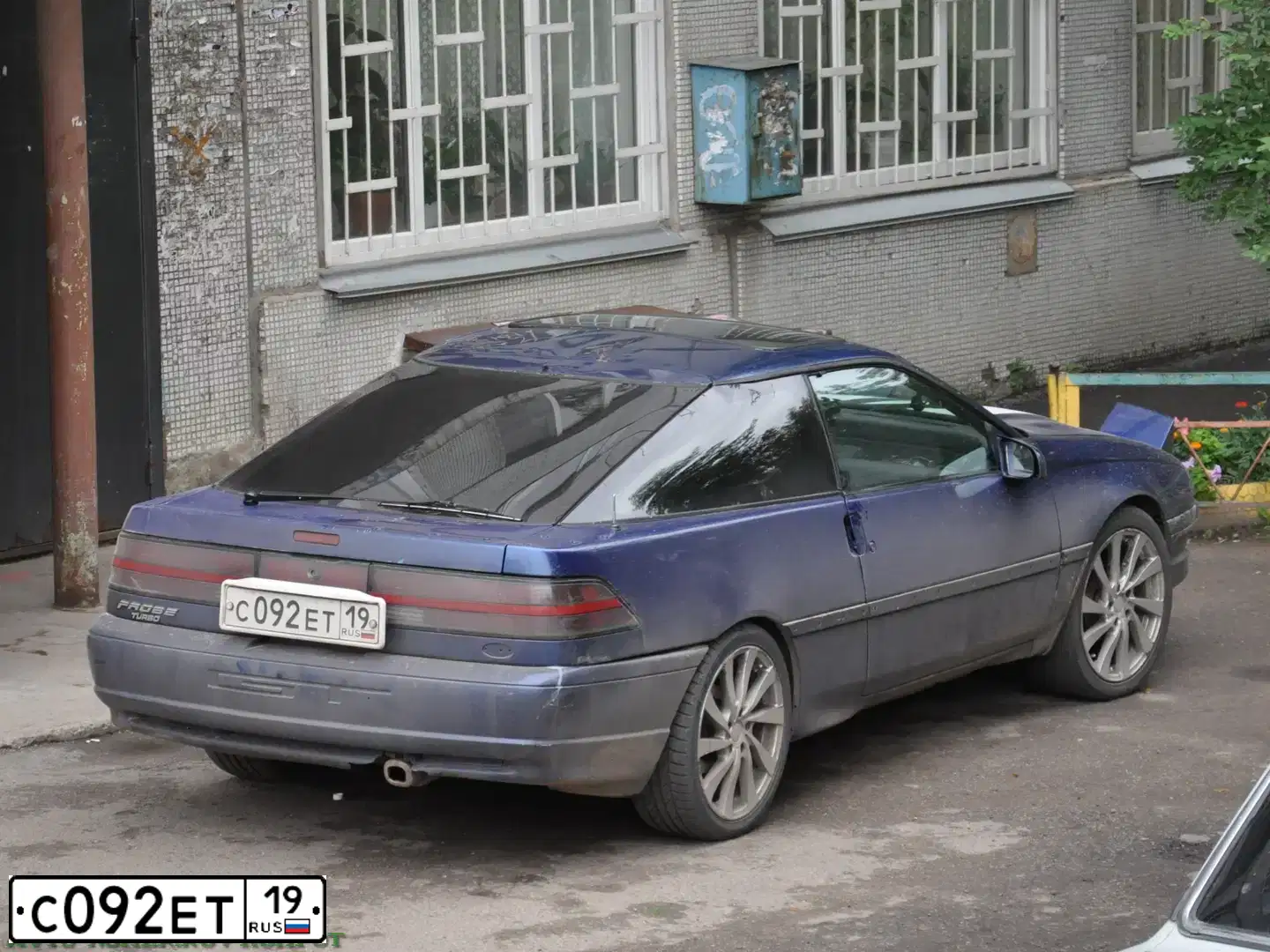 Фото автомобиля FORD PROBE, 1992 — госномер С092ЕТ19. Цвет: СИНИЙ