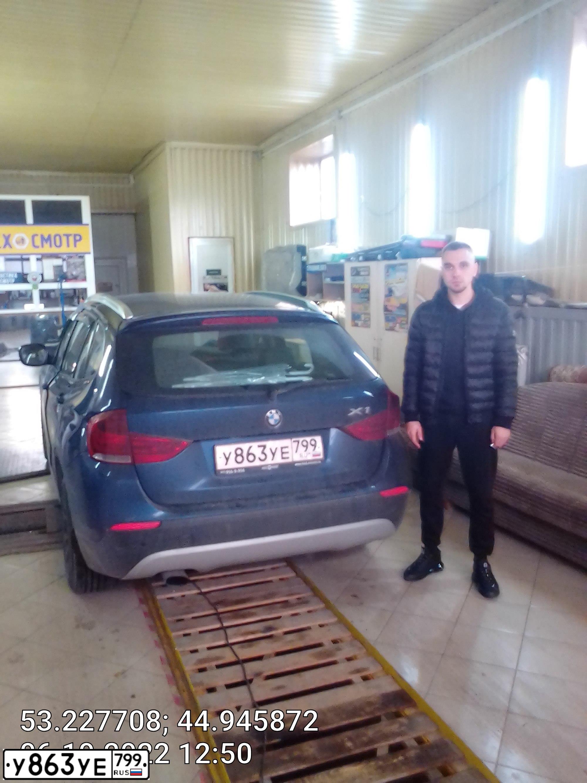 Фото автомобиля BMW X1, 2011 — госномер Т303ВУ58. Цвет: синий