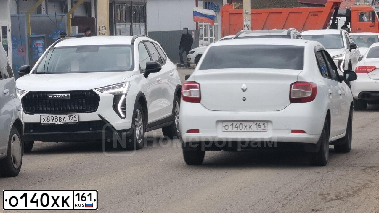 Фото автомобиля RENAULT LOGAN, 2017 — госномер О140ХК161. Цвет: Белый