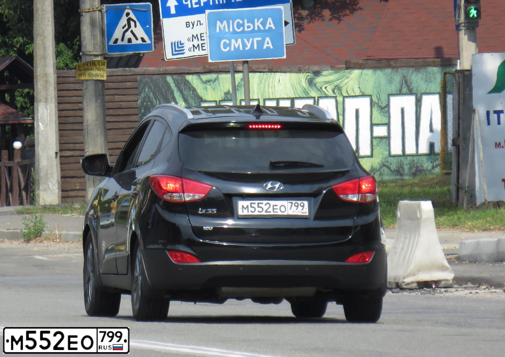 Фото автомобиля HYUNDAI IX35, 2014 — госномер Е505ЕА777. Цвет: ЧЕРНЫЙ
