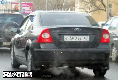 Фото автомобиля FORD FOCUS, 2007 — госномер Н219УЕ69. Цвет: ЧЕРНЫЙ