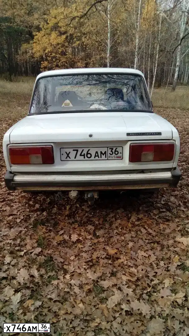 Фото автомобиля LADA 2105, 1998 — госномер Х746АМ36. Цвет: БЕЛЫЙ
